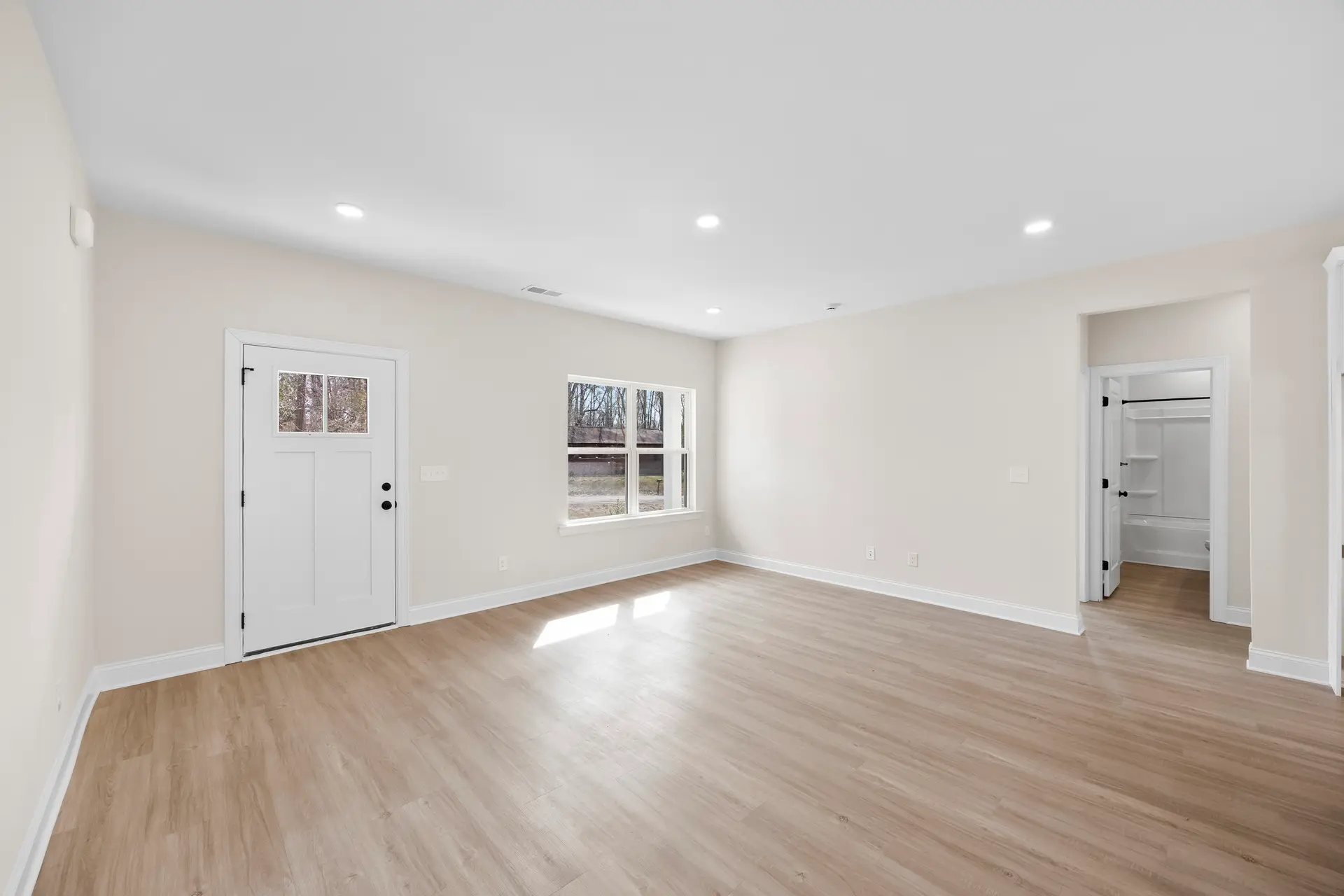 400 Brice St living room and hall bath