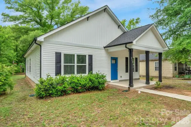Front exterior corner of 211 Baker St